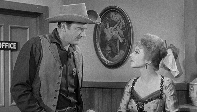 James Arness and Amanda Blake in Gunsmoke