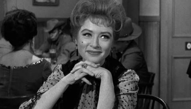 Amanda Blake as Miss Kitty on Gunsmoke