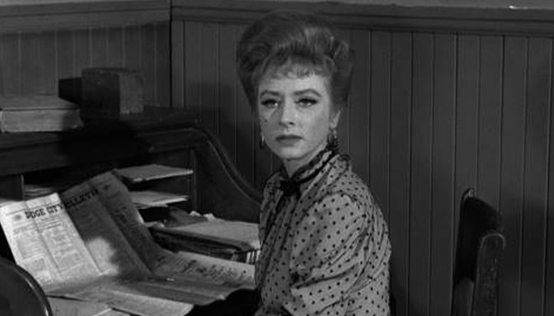 Amanda Blake as Miss Kitty on Gunsmoke